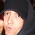 A pixelated image of a person wearing a black beanie, with text reading 'i <3 dan' in blue and black at the bottom right.