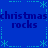 Blue background with repeated 'christmas rocks' text and light blue asterisk-like symbols arranged in a pattern