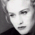 A split-frame contact sheet showing a grayscale portrait on the left and green pixelated text on a dark background on the right, with visible dithering and low-resolution rendering artifacts.