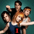 Four people pose together against a teal background with red text changing across frames.