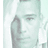 Static 48x48 pixel icon showing a low-resolution grayscale portrait of a person with light skin tone and dark hair, rendered in a soft pastel color palette with visible dithering and pixelation.