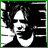 A 48x48 pixel animated contact sheet showing two frames: a black-and-white portrait of a person with curly hair on the left and stylized 'GC' monogram letters on the right, both in high-contrast pixel art style.