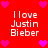 Red background with white text reading "I love Justin Bieber" repeated four times, surrounded by pink heart symbols.