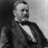 Black-and-white portrait of a man in formal attire with bow tie and suit jacket, displayed across four showing progressive cropping