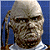 Pixelated image of a mummy-like figure with bandaged head and face against blue background, next to green text reading 'Original Icons .com'