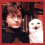 A pixelated image of a person with brown hair and dark clothing holding a white owl, displayed in three