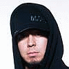 A four- shows a person in black hooded clothing with changing facial expressions and head positions, alongside pixelated text reading "YOU WANNA BE AN EMCEE? YOU GOTTA STUDY THE SKILLS!"