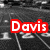 Black-and-white track field image with red text overlays reading "Davis Raiders" and "Track" on a grayscale background.
