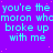 Static image with repeated cyan text on purple background, featuring pixelated dots and a gray rectangle in bottom-right corner.