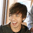 A pixelated image shows a person with brown hair and dark clothing on the left, next to blue text reading "KEV CHEESY <3" on a black background.