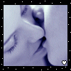 Two side-by-side frames of a kissing couple with closed eyes, each framed by black borders with white dots and featuring a small heart icon at the bottom right.