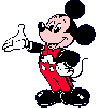 Pixelated Mickey Mouse in red shorts, black shoes, white gloves, and a bow tie gestures with his right hand