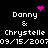 Pixelated text displays 'Danny & Chrystelle' with date '09/15/2007', accompanied by pink heart and starburst icons on black background.