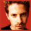 Four- with red background showing a person's face, eye close-up, and 'OZ' text in black