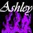 Pixelated image with stylized text 'Ashley' in white above purple flame-like shapes on a black background.