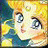 Pixelated anime-style character with blonde hair and blue eyes, wearing a blue top, next to black background with white text.