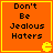 Four orange square with yellow borders display black text reading "Don't Be Jealous Haters" and a small yellow Pac-Man icon in the bottom-right corner of each