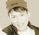 Two side-by-side pixelated images of a person wearing different hats against distinct backgrounds.
