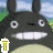 Animated contact sheet of a black rabbit-like character with large white eyes and a beige belly, showing sequential text changes from 'T' to 'Totoro' across 8 frames.