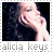 Alicia Keys profile icon with two states: one showing gray text 'alicia keys' and another showing yellow text 'alicia keys', both with a pixelated image of a woman resting her chin on her hand against a dark background.