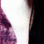 A 2x2 contact sheet of a pixelated animated icon featuring close-up facial details with dark hair, white skin tones, and purple/magenta accents across three sampled frames.