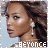 A 48x48 pixel animated contact sheet showing two side-by-side frames of a woman with brown skin, dark curly hair, and white earrings against a light blue background, with the text "BEYONCE" at the bottom.