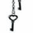 Black key with heart-shaped bow hanging from chain on white background, displayed in three vertical positions.