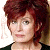 A split-frame contact sheet showing a pixelated portrait of a person with red hair on the left and green text reading "Original Icons .com" on a dark green background on the right.
