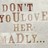 Pixelated text reads 'DON'T TO ULOVE HER. MADLY...' in brown and gray tones on a light background.