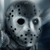 Static pixelated image of a hockey mask with dark eye holes and small black dots on the surface, set against a gradient background.