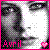 Pixelated image of a stylized face with dark hair, pink border, and 'April' text at bottom left.
