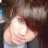 A person with brown hair holds a large pink heart-shaped object, while green text appears over the image.