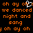 Pixelated orange text on black background with white heart symbol replacing 'x' in 'oh ay oh x oh ay oh', repeating 'we danced night and sang' lines.
