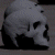 A 50x50 pixel buddy icon featuring a grayscale skull on the left and green text 'Original Icons .com' on a dark background.