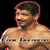 A pixelated image of a shirtless man with short dark hair and a mustache, standing against a black background, next to green text on a red background.