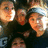 A pixelated group photo of four people on the left, next to a blue background with white text reading "gar softball #11".