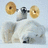 A polar bear lifts a barbell with golden weights against a light background, paired with text on blue and gray