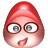Pixelated red egg-shaped character with wide eyes and a small open mouth on a gray background.