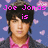 Pixelated image of a person with dark hair wearing a pink shirt and dark jacket against blue background with pink flower shapes, text overlays in bright pink.
