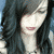 A static image of a woman with long dark hair and closed eyes, wearing red lipstick against a blue background.