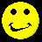 Four yellow pixelated smiley faces arranged in a against black background, each with distinct facial expressions including closed eyes and tongue-out poses