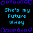 Pixelated text 'She's my Future Wifey' repeated across a black background with purple decorative borders, displayed in a with cyan lettering