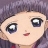 Pixelated close-up of a character's face with large eyes, light skin, and purple hair against a muted background.