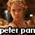 A static image of a person with curly blonde hair in a dark setting, overlaid with text reading "peter pan is my HOT! SEXAY BEAST!".