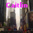 Pixelated image with pink text 'Caitlin' and '<3', dark vertical structures, light beams, and blurred background elements.
