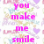 Animated text changes across three : 'you make me smile and the only thing i can say is' in pink, then 'laugh' in cyan, finally 'cry' in green with a background of repeated heart-shaped patterns