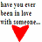 A pixelated image with text above two red heart shapes, one solid and one cracked, on a white background.
