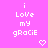 Pixelated text on a bright pink background with two heart symbols below the text.