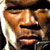 Pixelated close-up of a person with light skin tone, dark hair, and a dark headband, wearing a light-colored garment with visible texture.