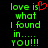 Green pixelated text reads "love is what I found in... you!!!" with a red heart symbol replacing the 'i' in 'is', displayed on a black background.